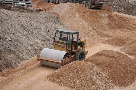 yellow sod roller parked near gavel thumbnail