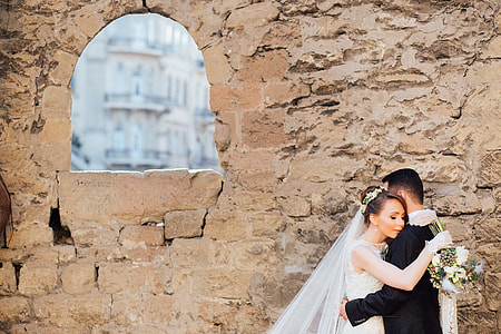 bride and groom hugging each other thumbnail