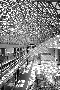 Grey Steel Frame Building Ceiling in Black and White Photograph during Daytime thumbnail