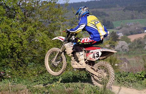 man riding motocross on dirty pathway thumbnail