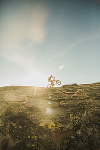 man cycling on mountain thumbnail