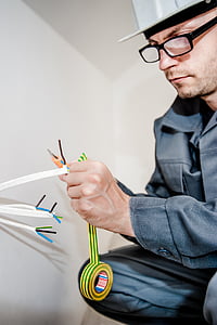 man working on electric wire thumbnail