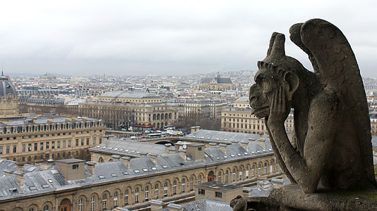 close up photo of gray concrete gargoyle thumbnail