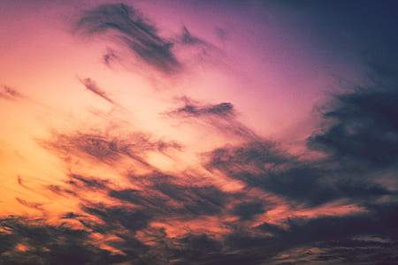 photography of pink sky with clouds during daytime thumbnail
