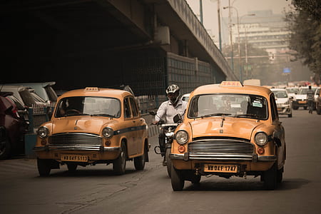 yellow cab on road thumbnail