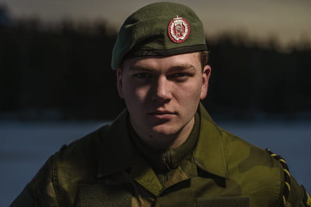 man wearing green military uniform thumbnail