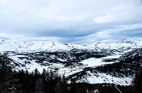 mountains covered with snow at daytime thumbnail