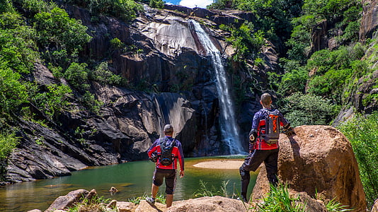 two men at waterfalls thumbnail