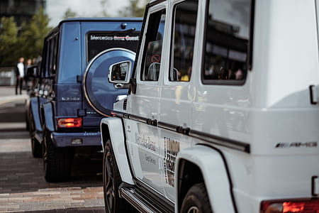two black and white SUV's thumbnail
