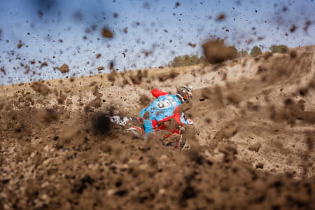 person riding motocross dirt bike thumbnail