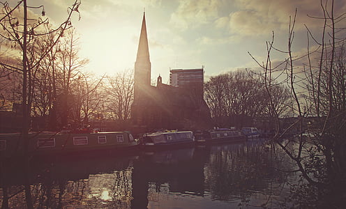 silhouette photography of concrete cathedral during sunrise thumbnail