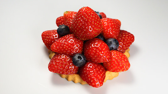 strawberries and barberries on top of biscuit thumbnail
