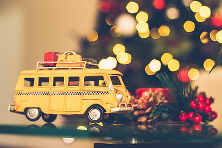 Selective Focus Photography of Yellow Vehicle Scale Model thumbnail