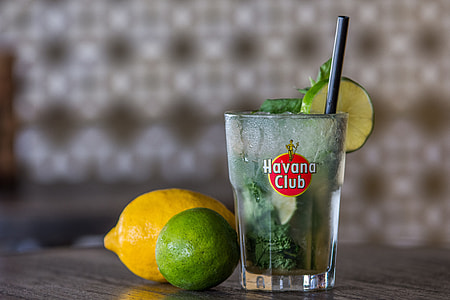 Havana Club drinking glass with lemon and lime on table thumbnail