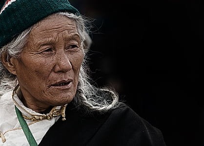 closeup of woman wearing black hat thumbnail