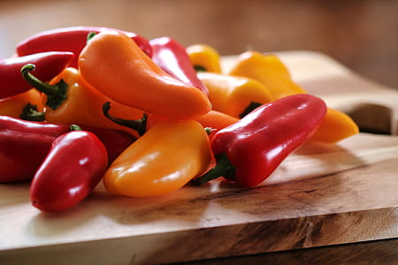 Yellow and Red Peppers on Table thumbnail