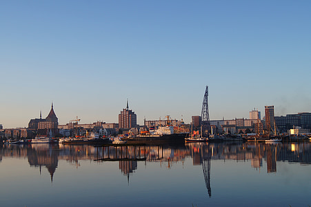 concrete structures beside body of water thumbnail