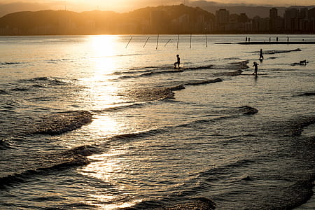 Photography of Body of Water during Sunset thumbnail