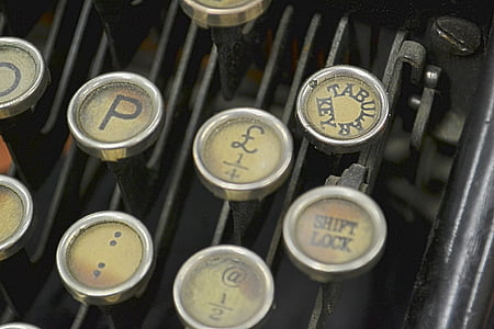 photo of silver and black cash register buttons thumbnail