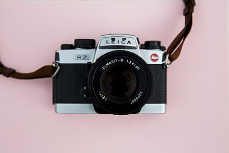 black and gray Leica point-and-shoot camera thumbnail