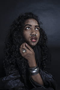 Woman Wearing Silver-colored Bracelets, Rings, and Nose Rings thumbnail