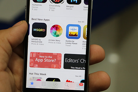 person holding black smartphone thumbnail