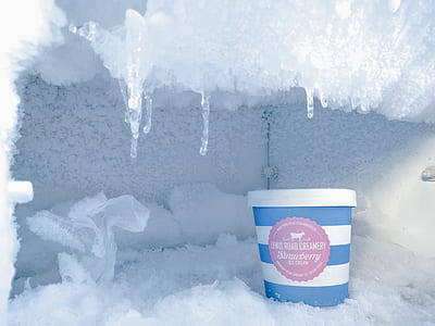 white and blue strawberry ice cream in freezer thumbnail
