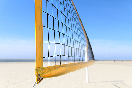 Volleyball net on a sandy beach thumbnail