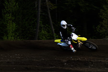 man riding motocross dirt bike thumbnail