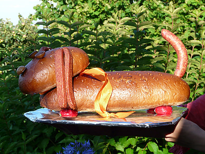bread with sausage on tray thumbnail