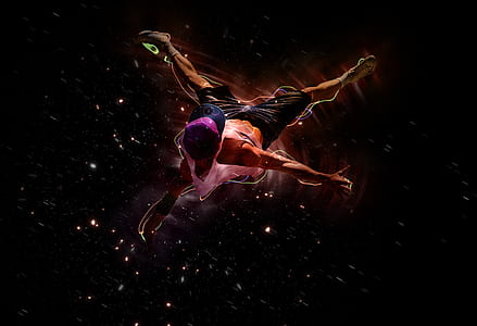 man in orange tank top and black shorts spinning digital wallpaper thumbnail