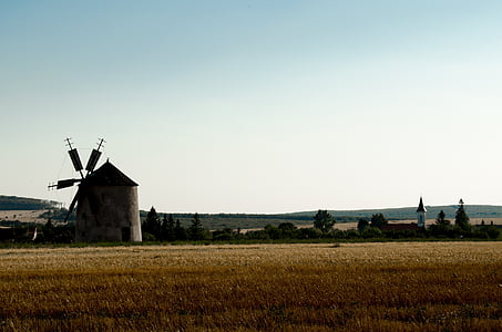 white and brown windmill during daytime thumbnail