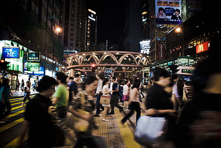 people crossing the street at night time thumbnail