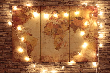 world man 3-panel decor with string lights mounted on brown bricked wall thumbnail
