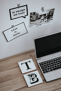 Inspirational cards with quotes, a black-and-white photo and a silver laptop thumbnail