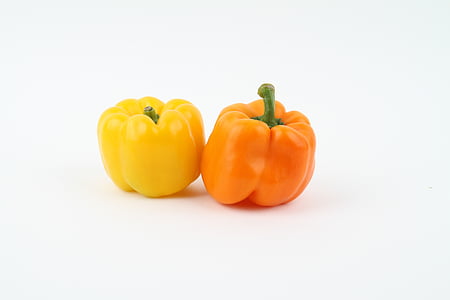 close-up photo of two yellow and orange bell pepper s thumbnail