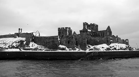 greyscale photo of palace during daytime thumbnail