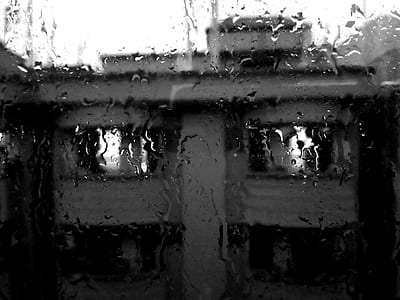Rain Pouring on Glass Window thumbnail