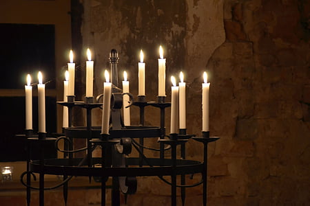 lit candles on candle holder thumbnail