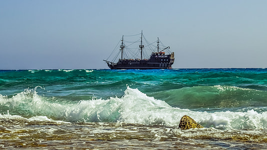 brown galleon ship during daytime thumbnail