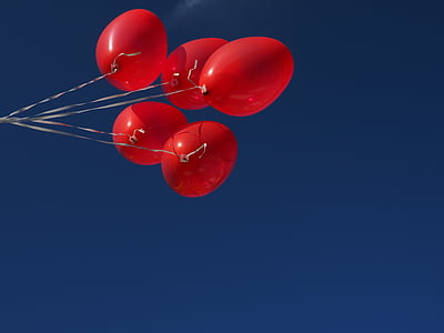 five red balloons with strings thumbnail