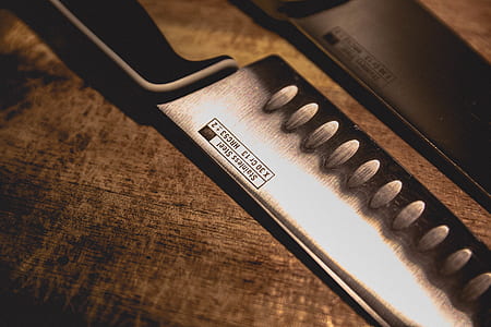 two grey steel knives thumbnail