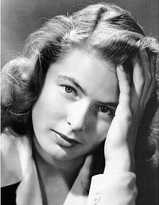 grayscale of woman holding her hair thumbnail
