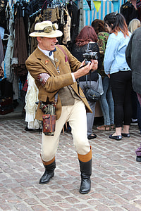 man holding black DSLR camera thumbnail