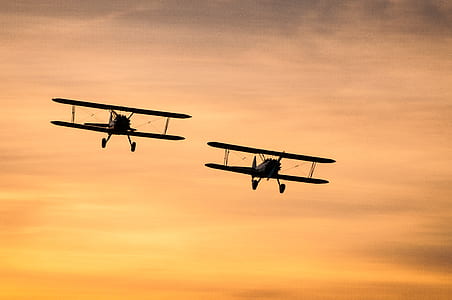 two biplanes in flight thumbnail