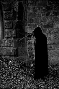 grim reaper standing beside wall thumbnail