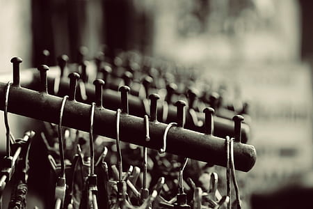 Grayscale Photography of Hangers on Rack thumbnail