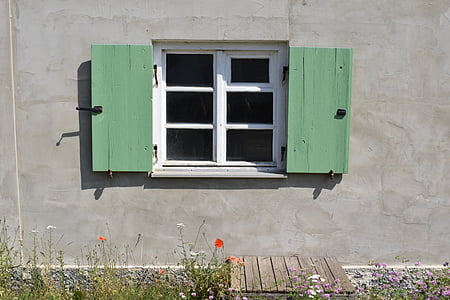 square white frame window near plants thumbnail