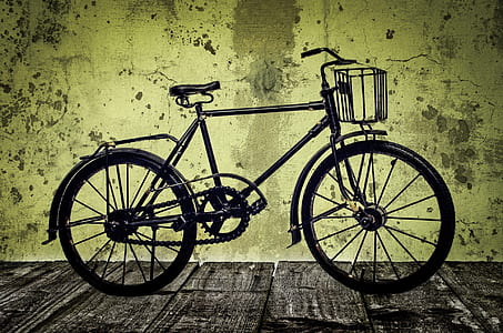 black commuter bicycle with green background thumbnail