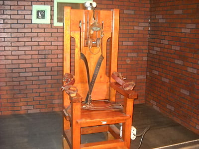 brown wooden armchair thumbnail